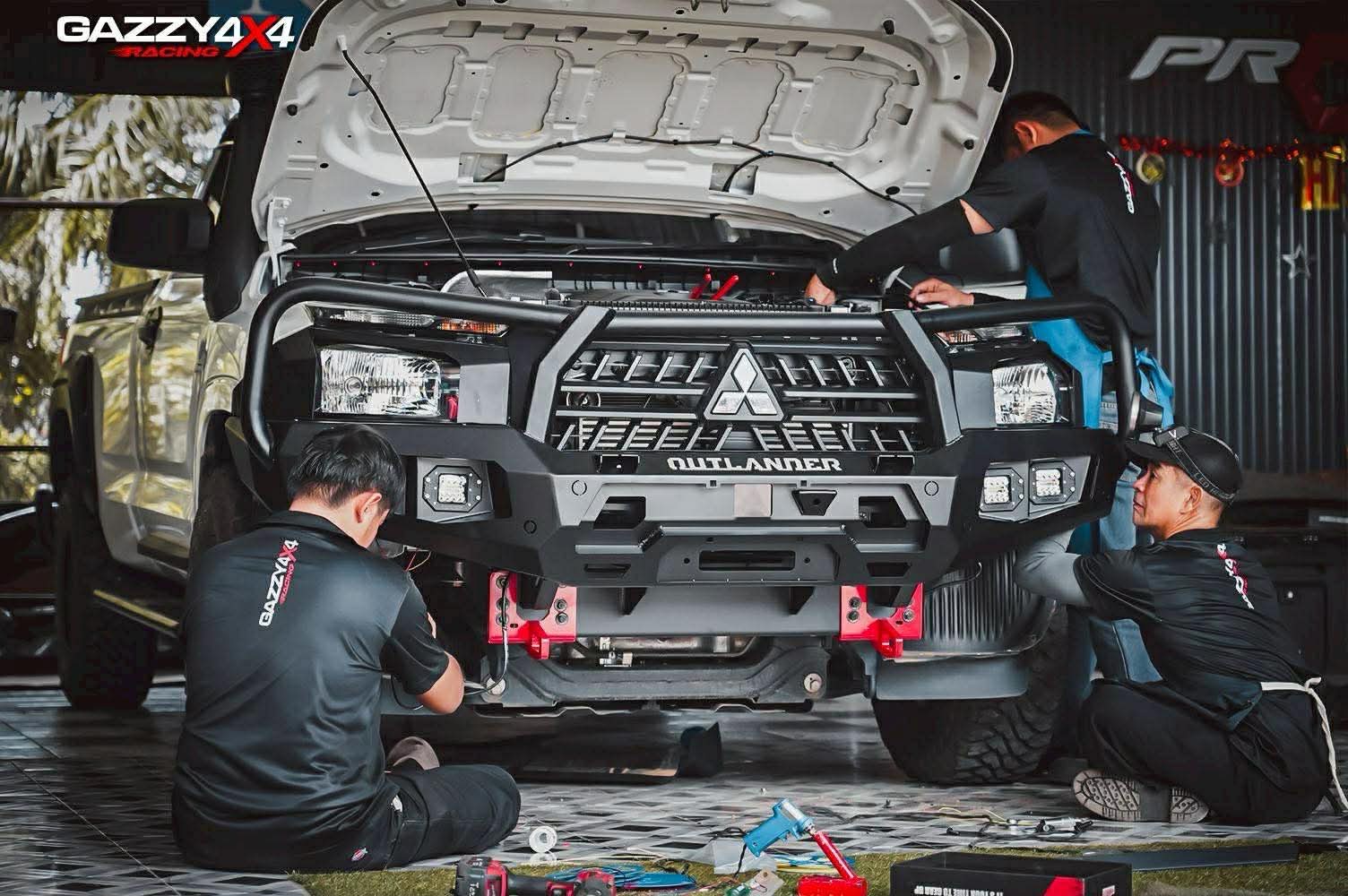 Gazzy4x4 team installing Outlander front bumper